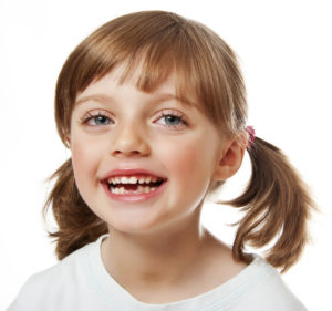 child with missing teeth